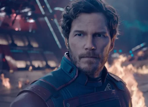 Chris Pratt smiling as Star-Lord, wearing his iconic red helmet.