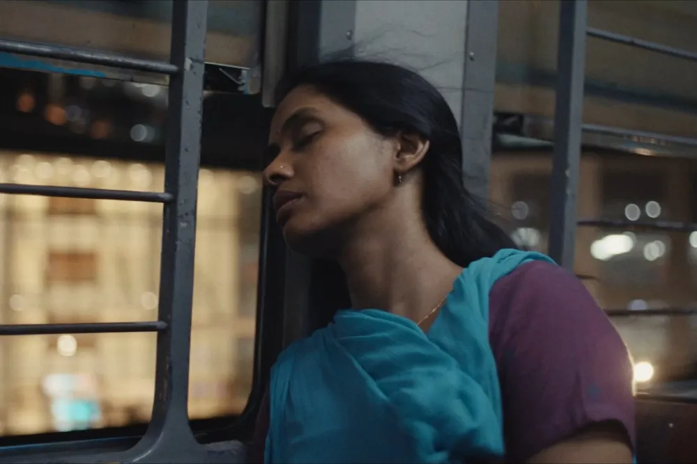 Anjali Patil as Selvi, a homecare nurse, looking tired but determined.
