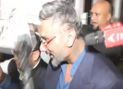 Yo Yo Honey Singh being questioned by police.