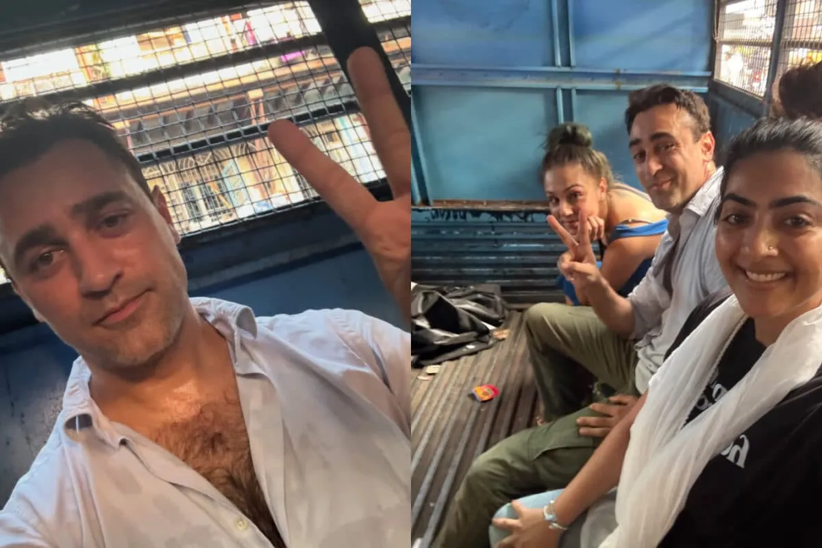 Actor Imran Khan looking relaxed and a bit amused inside a police van, taking a selfie.