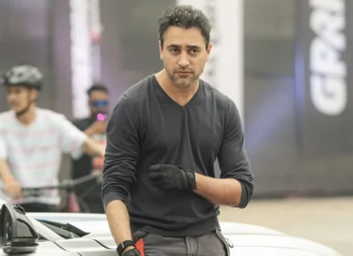 Actor Imran Khan looking serious, perhaps outside a courtroom.