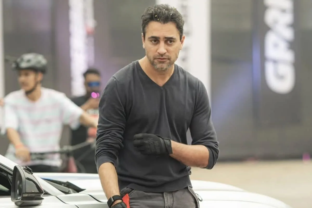 Actor Imran Khan looking serious, perhaps outside a courtroom.