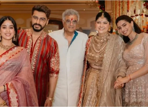 Janhvi Kapoor and Arjun Kapoor smiling on a talk show.