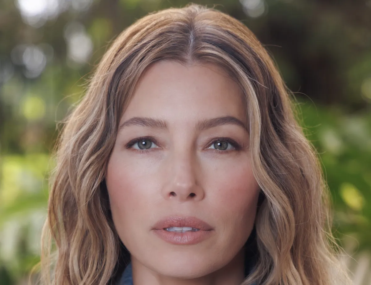 Headshot of actress Jessica Biel smiling at the camera.