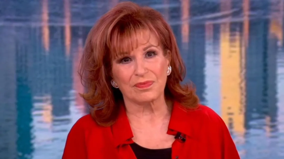 Joy Behar smiling on a TV show set.