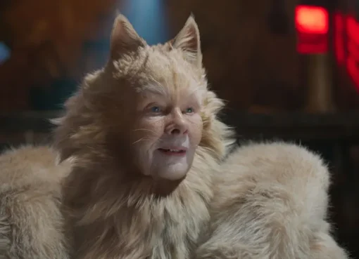 Judi Dench looking thoughtful during an interview.