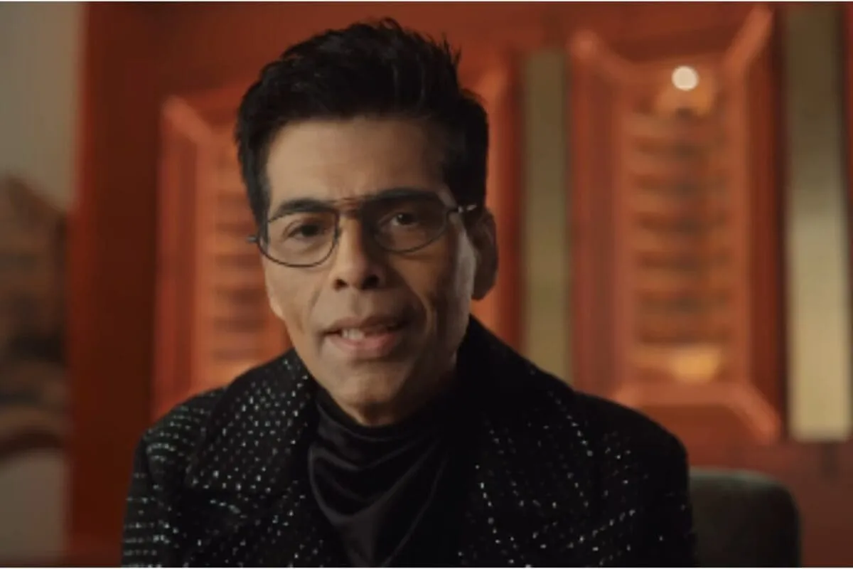 Karan Johar on a couch