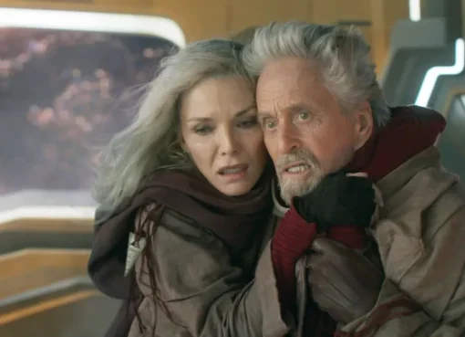 Michael Douglas as Hank Pym in his Ant-Man costume looking thoughtful.