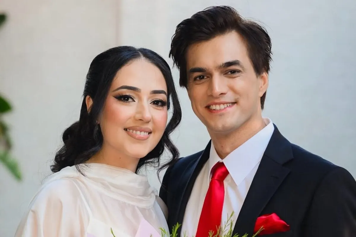 Mohsin Khan smiling at a private event