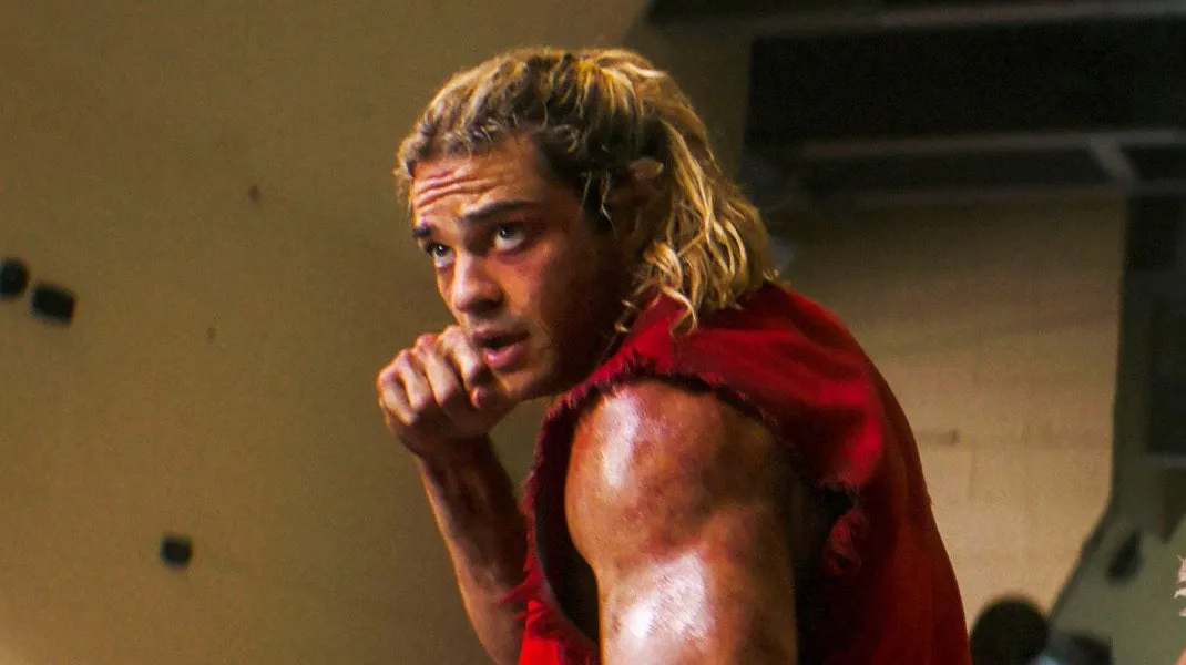 Noah Centineo striking a fighting pose.