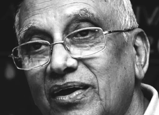 A portrait of Indian filmmaker Singeetham Srinivasa Rao.