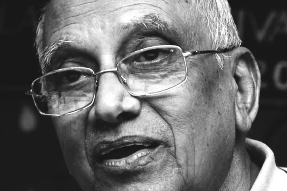 A portrait of Indian filmmaker Singeetham Srinivasa Rao.