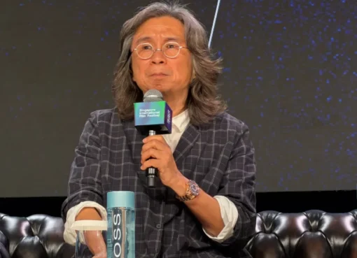 Acclaimed Asian filmmaker Peter Chan Ho-sun smiling warmly.