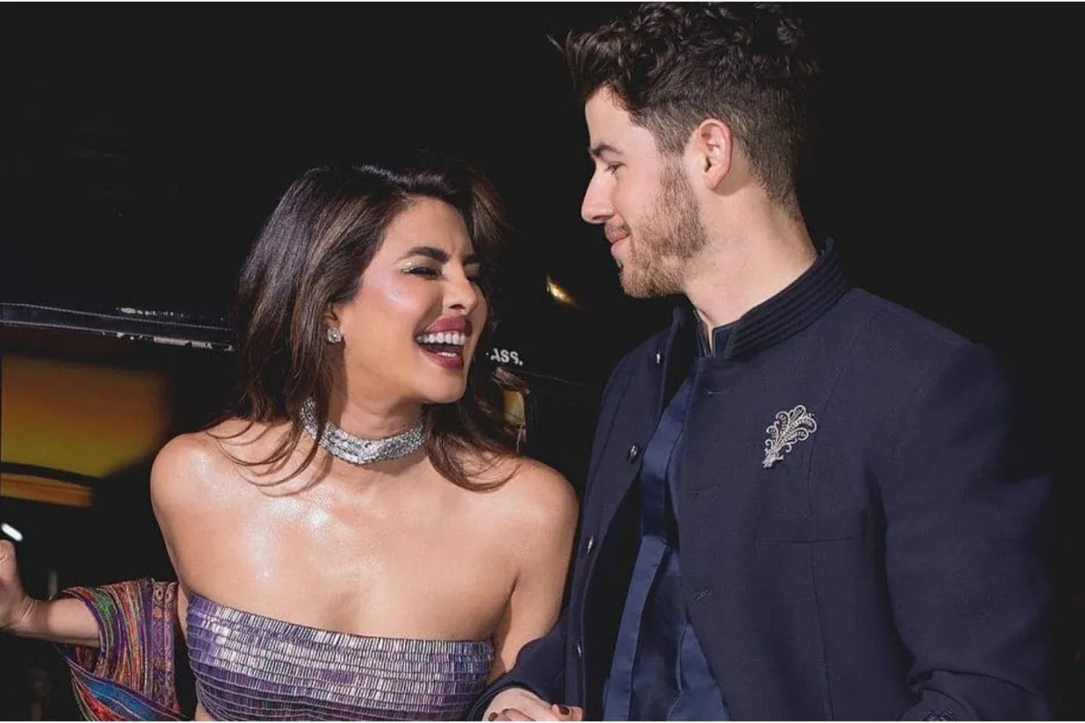 Priyanka Chopra's hand with intricate mehendi designs.