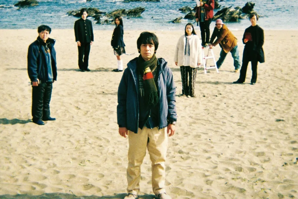 Director Ueda Shinichiro smiling cheerfully.