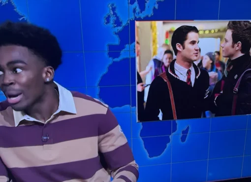 Michael Che on the Weekend Update desk, looking serious.