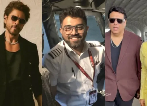 Shah Rukh Khan smiling with a pilot.