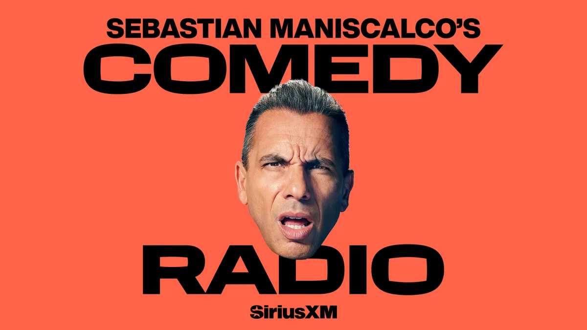 A microphone on a comedy club stage.