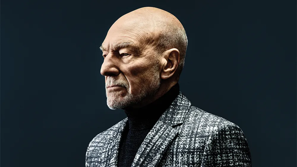 A photo of Patrick Stewart smiling warmly.