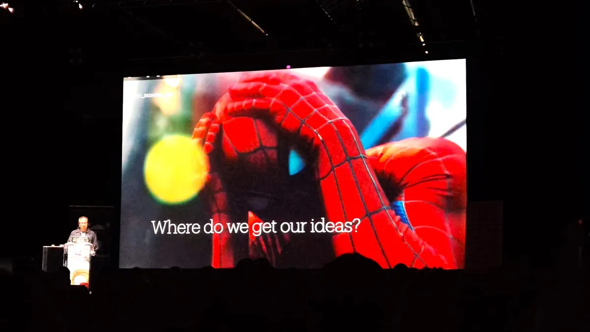 Spider-Man swinging through a vibrant city with visual effects highlighting his movement and a dynamic, colorful aesthetic.