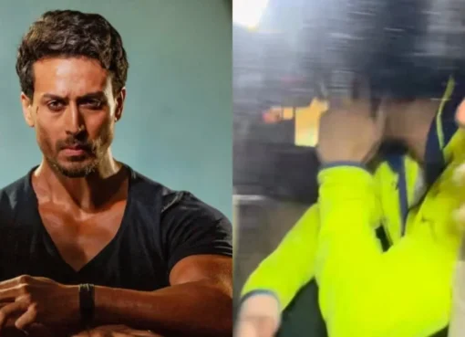 Tiger Shroff in a police car with a bandaged hand, face hidden.