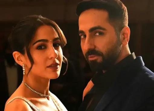 Ayushmann Khurrana and Sara Ali Khan smiling in a movie scene.