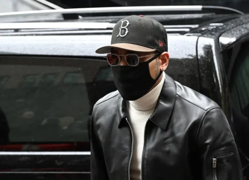 Chris Brown looking serious in a photo or public setting.