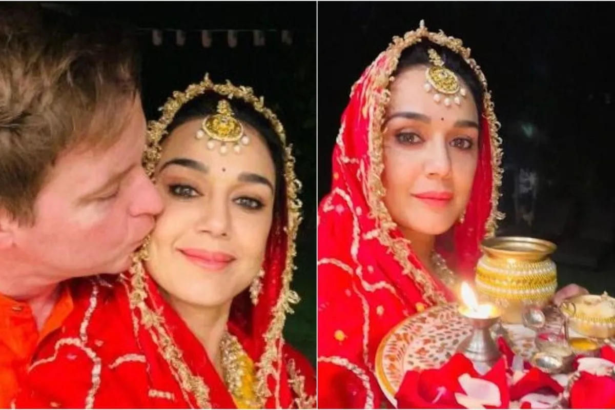 Preity Zinta looking concerned, possibly holding her hands together, as she waits for the moon.
