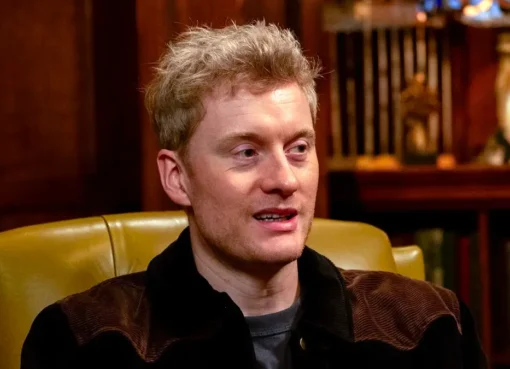 Comedian James Acaster looking thoughtful or surprised.