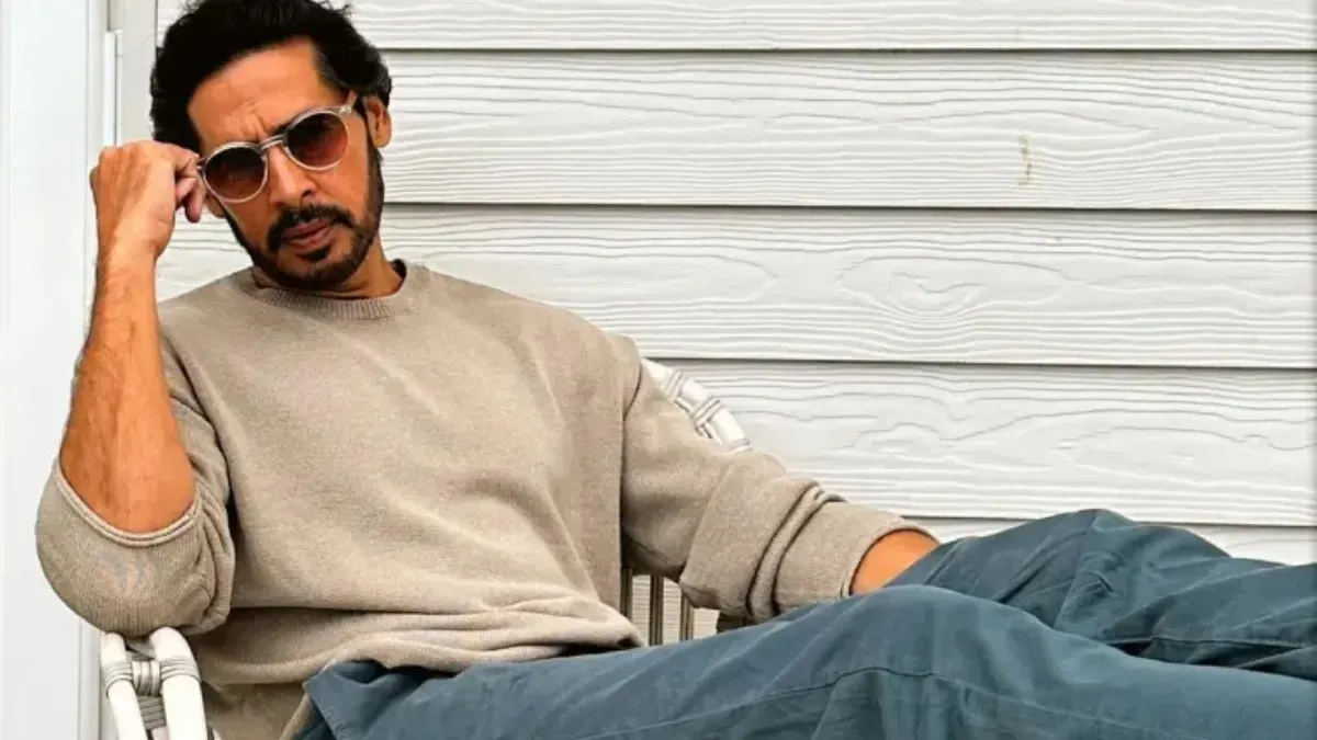 Dino Morea looking concerned or thoughtful, addressing reports.