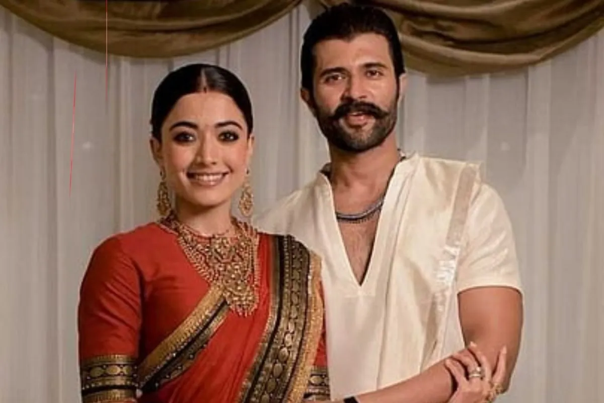 Vijay Deverakonda and Rashmika Mandanna looking serious and determined.