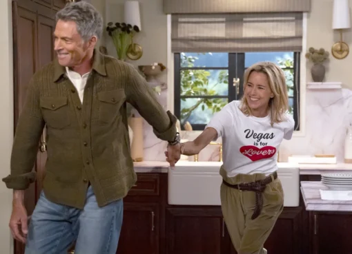 Tim Daly and Téa Leoni smiling together as a couple in character for 'Newlyweds'.
