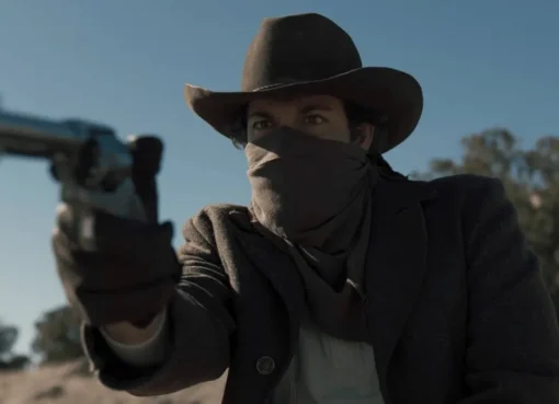 Zachary Levi dressed as a cowboy in a Western scene, looking rugged.